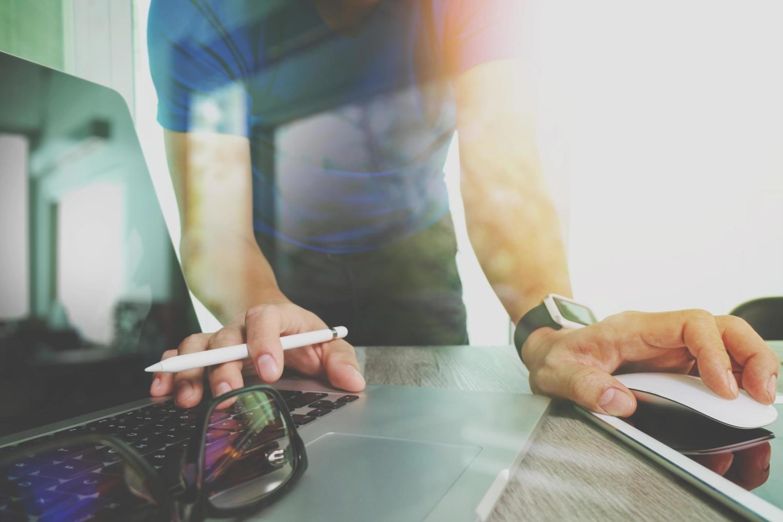 Professional testing environment with multiple monitors displaying code analysis and bug tracking systems