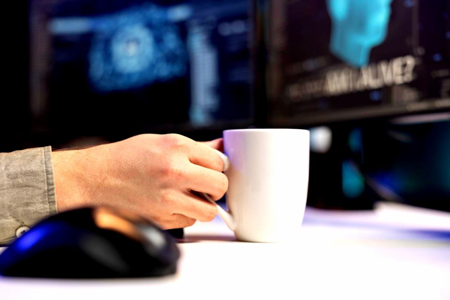 Business team reviewing test results on data visualization dashboards showing system performance metrics